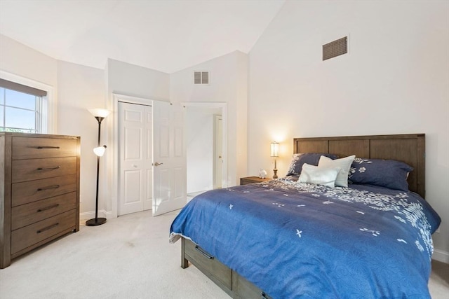 74 Hidden Bay Dr Unit 74, Dartmouth, MA 02748 - carpeted bedroom with baseboards and high vaulted ceiling