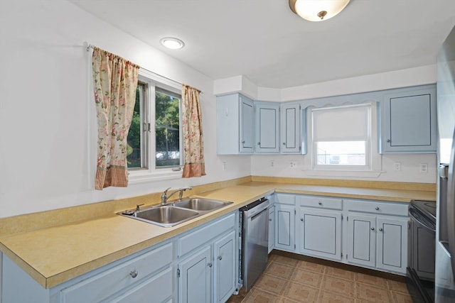 kitchen with sink, black electric range, and stainless steel dishwasher