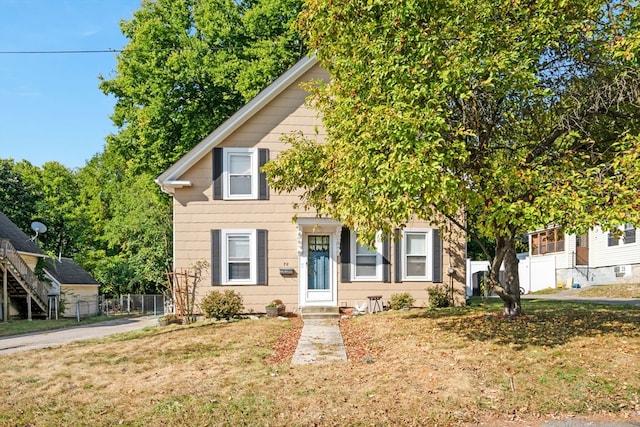 view of front of home with a front yard