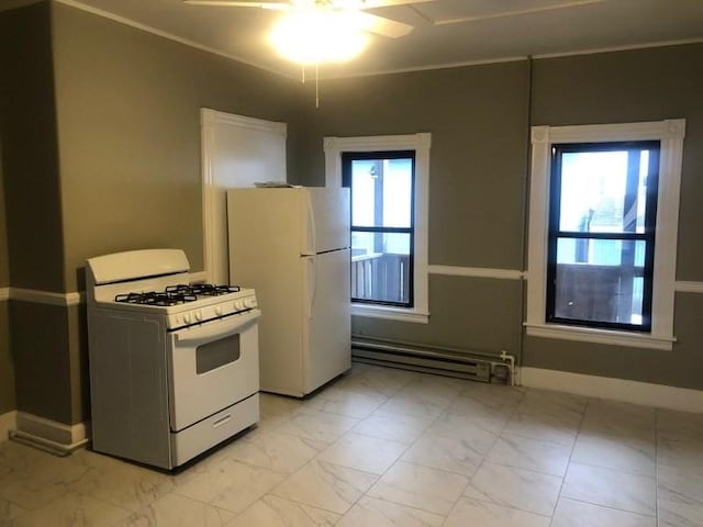 kitchen featuring a baseboard radiator, white appliances, a healthy amount of sunlight, and marble finish floor