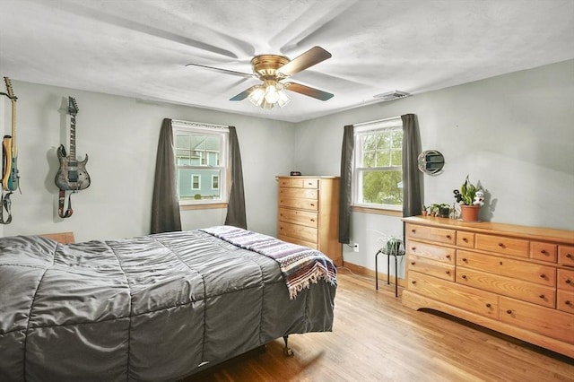 6 Batten St, Webster, MA 01570 - bedroom with light wood-type flooring, a ceiling fan, and baseboards
