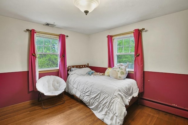 6 Batten St, Webster, MA 01570 - bedroom featuring baseboard heating and wood finished floors