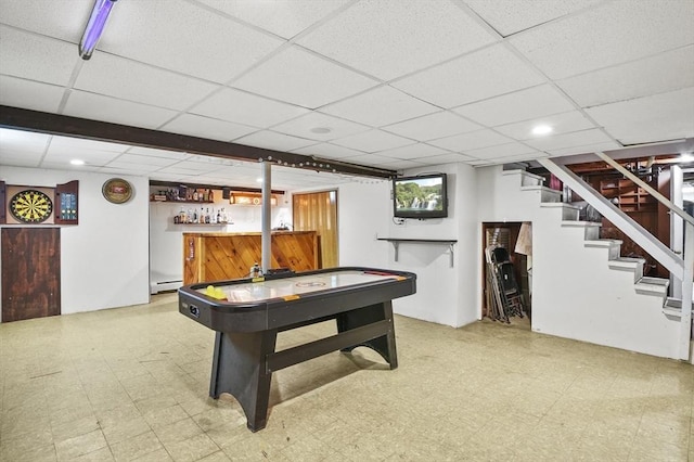 6 Batten St, Webster, MA 01570 - recreation room with light flooring, a bar, a baseboard heating unit, and a drop ceiling