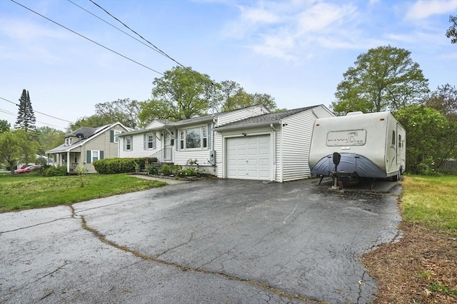 6 Batten St, Webster, MA 01570 - view of front of home featuring a garage, driveway, and a front yard