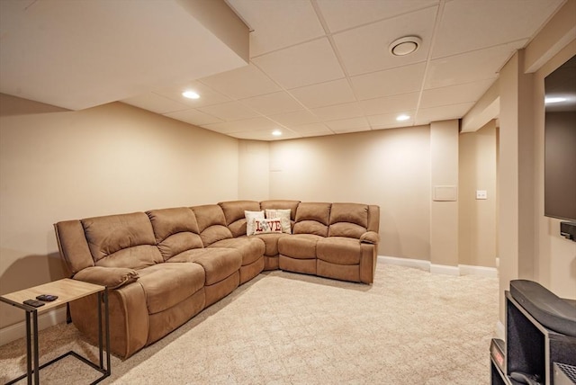 living area with carpet flooring, recessed lighting, baseboards, and a drop ceiling