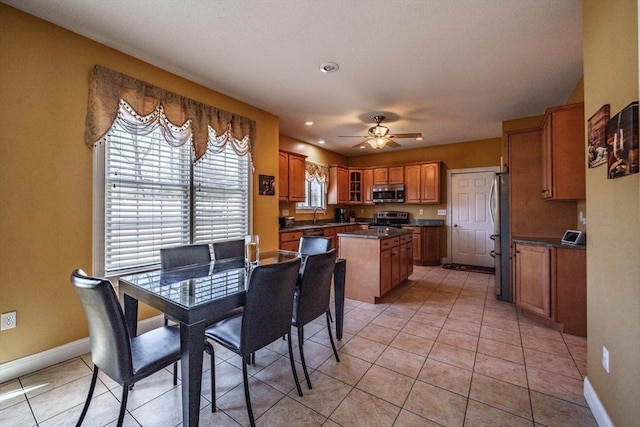 dining room featuring light tile patterned floors, recessed lighting, a ceiling fan, and baseboards