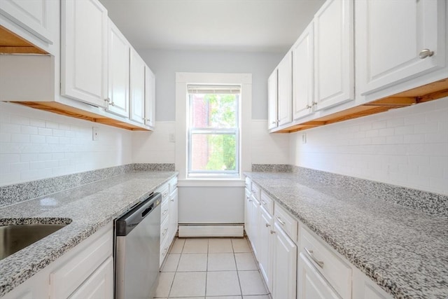 36 3rd St, Lowell, MA 01850 - kitchen with stainless steel dishwasher, a baseboard radiator, white cabinets, and tasteful backsplash