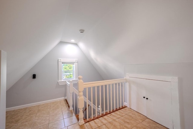36 3rd St, Lowell, MA 01850 - additional living space featuring lofted ceiling and light tile patterned floors