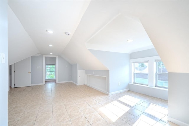 36 3rd St, Lowell, MA 01850 - additional living space featuring vaulted ceiling and tile patterned floors