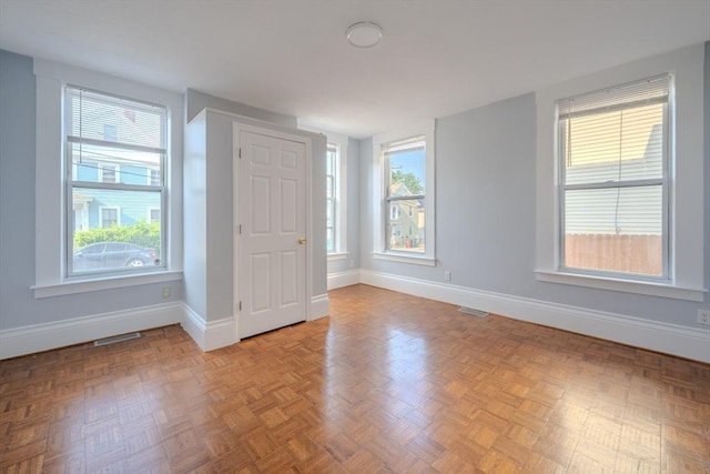 36 3rd St, Lowell, MA 01850 - empty room featuring healthy amount of natural light