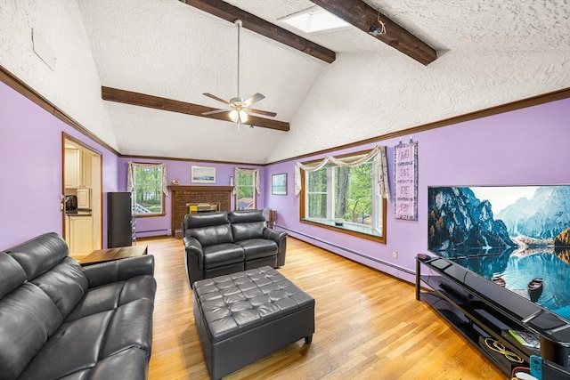 89 Gray St, North Andover, MA 01845 - living room with light wood finished floors, ceiling fan, a baseboard radiator, a baseboard heating unit, and a brick fireplace
