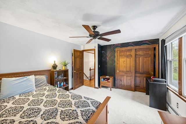 89 Gray St, North Andover, MA 01845 - carpeted bedroom with baseboard heating and ceiling fan