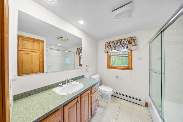 89 Gray St, North Andover, MA 01845 - bathroom featuring a baseboard radiator, vanity, tile patterned flooring, enclosed tub / shower combo, and recessed lighting