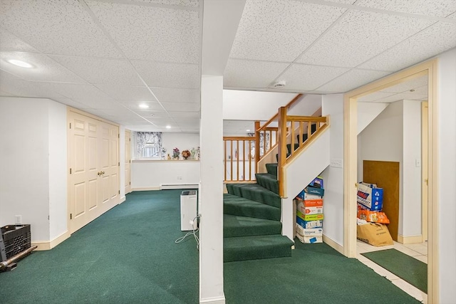 89 Gray St, North Andover, MA 01845 - finished basement with carpet, a drop ceiling, stairway, recessed lighting, and baseboard heating
