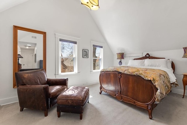 bedroom featuring baseboards, vaulted ceiling, light carpet, and visible vents
