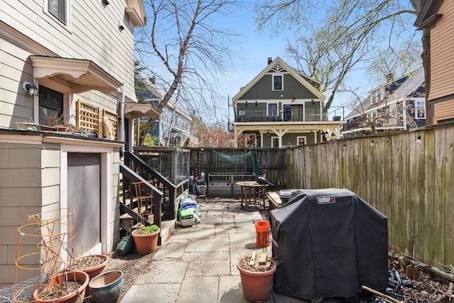 view of patio / terrace with a fenced backyard and grilling area