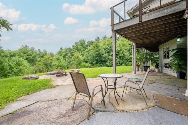 view of patio featuring a fire pit