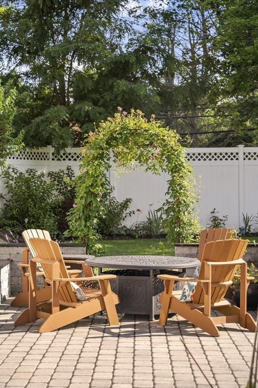 view of patio / terrace featuring fence