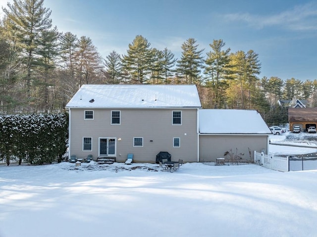 view of snow covered property