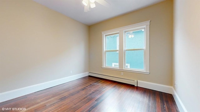 empty room featuring a baseboard radiator, ceiling fan, and dark hardwood / wood-style flooring