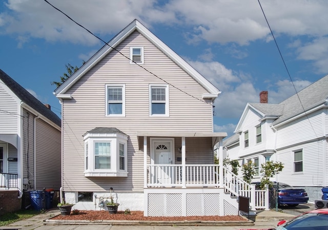 view of property with a porch