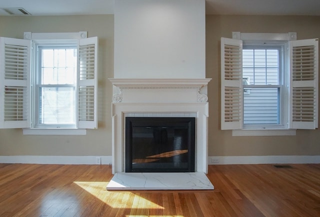 interior details featuring hardwood / wood-style floors