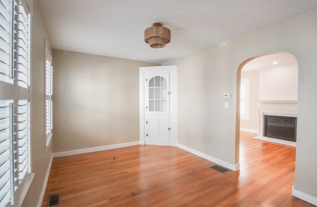 empty room featuring wood-type flooring