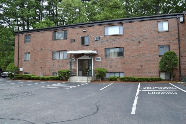 77 Nicholas Rd Unit I, Framingham, MA 01701 - view of building exterior with uncovered parking