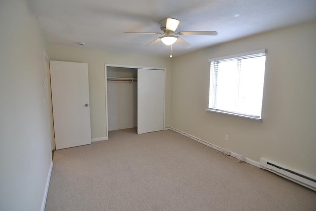 77 Nicholas Rd Unit I, Framingham, MA 01701 - unfurnished bedroom featuring baseboard heating, light carpet, a closet, baseboards, and a ceiling fan