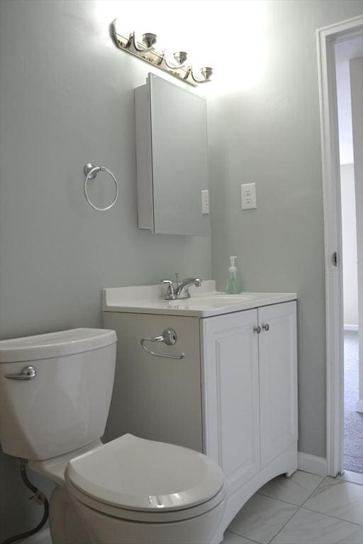 77 Nicholas Rd Unit I, Framingham, MA 01701 - half bathroom with toilet and vanity
