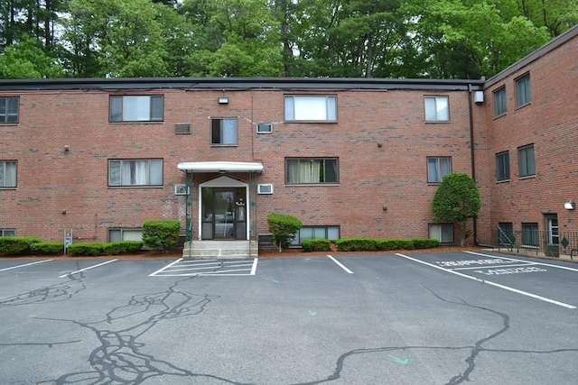 77 Nicholas Rd Unit I, Framingham, MA 01701 - view of building exterior featuring uncovered parking