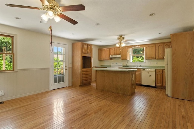 14 Doris Dr, Abington, MA 02351 - kitchen with white appliances, ceiling fan, under cabinet range hood, light wood-type flooring, and wainscoting
