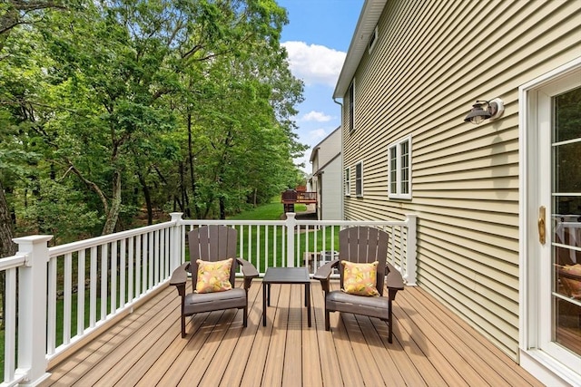 65 Saint Anthony St, Fitchburg, MA 01420 - wooden terrace with an outdoor hangout area