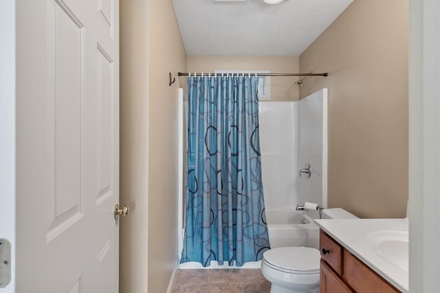 65 Saint Anthony St, Fitchburg, MA 01420 - bathroom with shower / tub combo, toilet, vanity, and baseboards