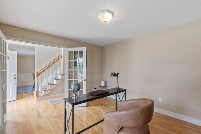 65 Saint Anthony St, Fitchburg, MA 01420 - home office featuring light wood-type flooring and baseboards
