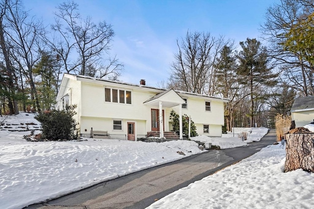 split foyer home with a chimney