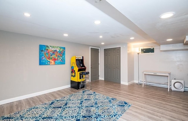 recreation room featuring wood-type flooring