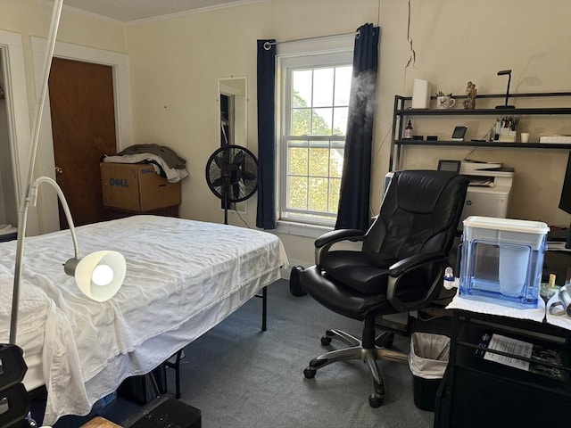 carpeted bedroom featuring ornamental molding