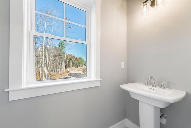 bathroom featuring baseboards