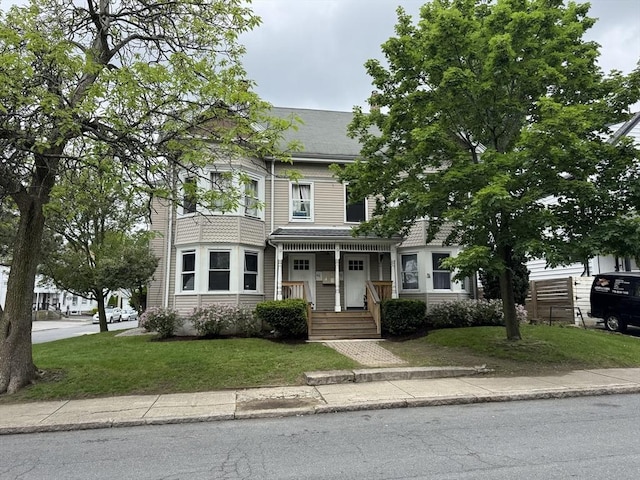 40 Freeman St, Framingham, MA 01702 - view of front of home featuring a front lawn
