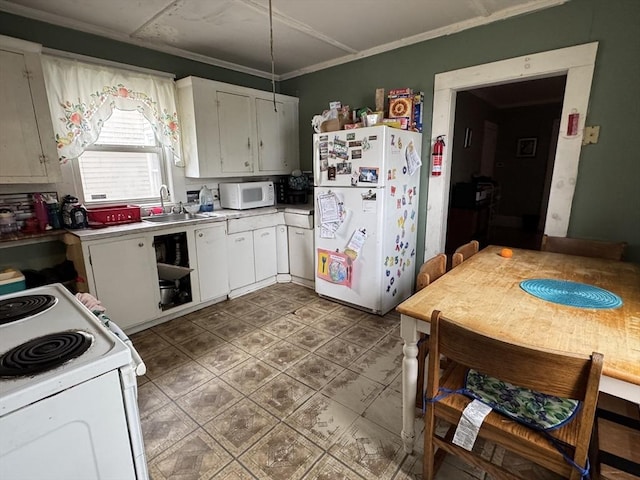 40 Freeman St, Framingham, MA 01702 - kitchen with white appliances, a sink, light countertops, white cabinets, and crown molding