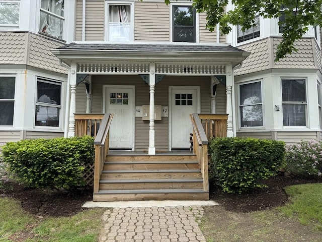 40 Freeman St, Framingham, MA 01702 - doorway to property featuring covered porch