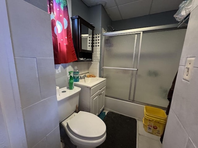 40 Freeman St, Framingham, MA 01702 - bathroom featuring vanity, toilet, shower / bath combination with glass door, and a drop ceiling