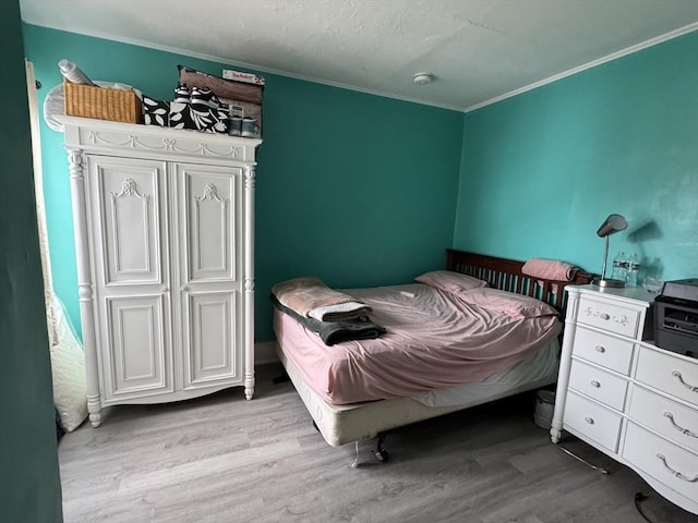 40 Freeman St, Framingham, MA 01702 - bedroom with wood finished floors and crown molding