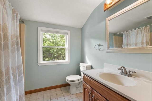 6 2nd Ave, Wilmington, MA 01887 - bathroom with vanity, toilet, vaulted ceiling, tile patterned floors, and baseboards