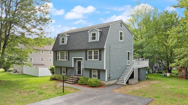 6 2nd Ave, Wilmington, MA 01887 - view of front of home with stairs, a gambrel roof, and roof with shingles