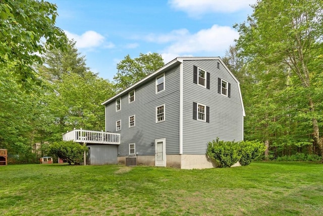 6 2nd Ave, Wilmington, MA 01887 - back of property with a yard, cooling unit, and a deck