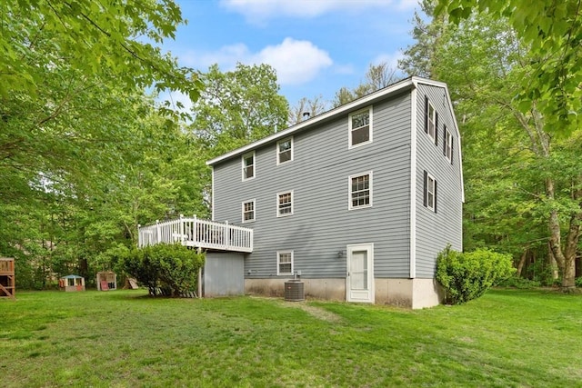 6 2nd Ave, Wilmington, MA 01887 - rear view of house featuring a yard, cooling unit, and a deck