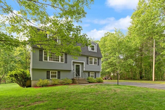 6 2nd Ave, Wilmington, MA 01887 - bi-level home with a front lawn and asphalt driveway
