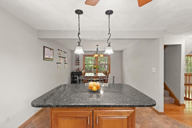 6 2nd Ave, Wilmington, MA 01887 - kitchen featuring plenty of natural light, a ceiling fan, and baseboards